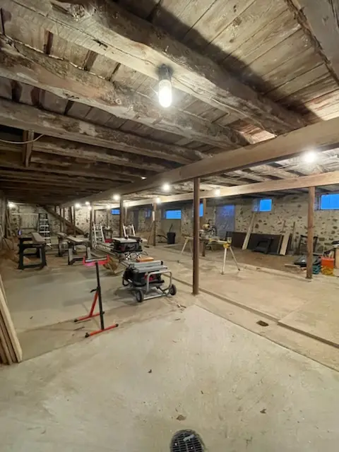 New structural posts and saws set up in the barn