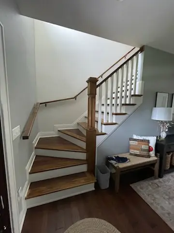 New oak-tread staircase with white risers and square balusters