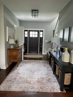 Entry hall with new floors and trim