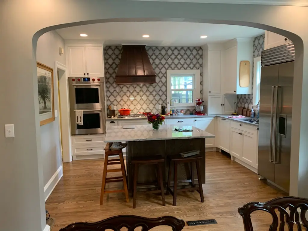 Finished kitchen through the arched opening